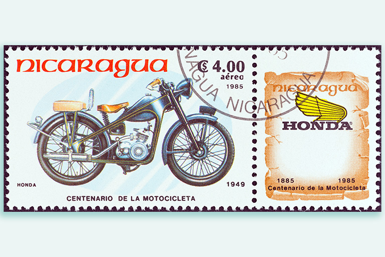Selo da Honda em comemoração ao centenário da motocicleta
